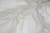 AnyConv.com__Tapeta-BIALA-winylowa-na-flizelinie-dynamiczna-imitacja-wiru-kwiatu-fal-3D-Marka-DIAMOND.jpg